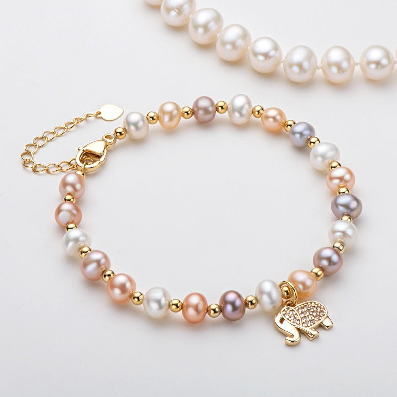 Elephant pearl bracelet with natural pearls, a perfect gift in gold packaging.