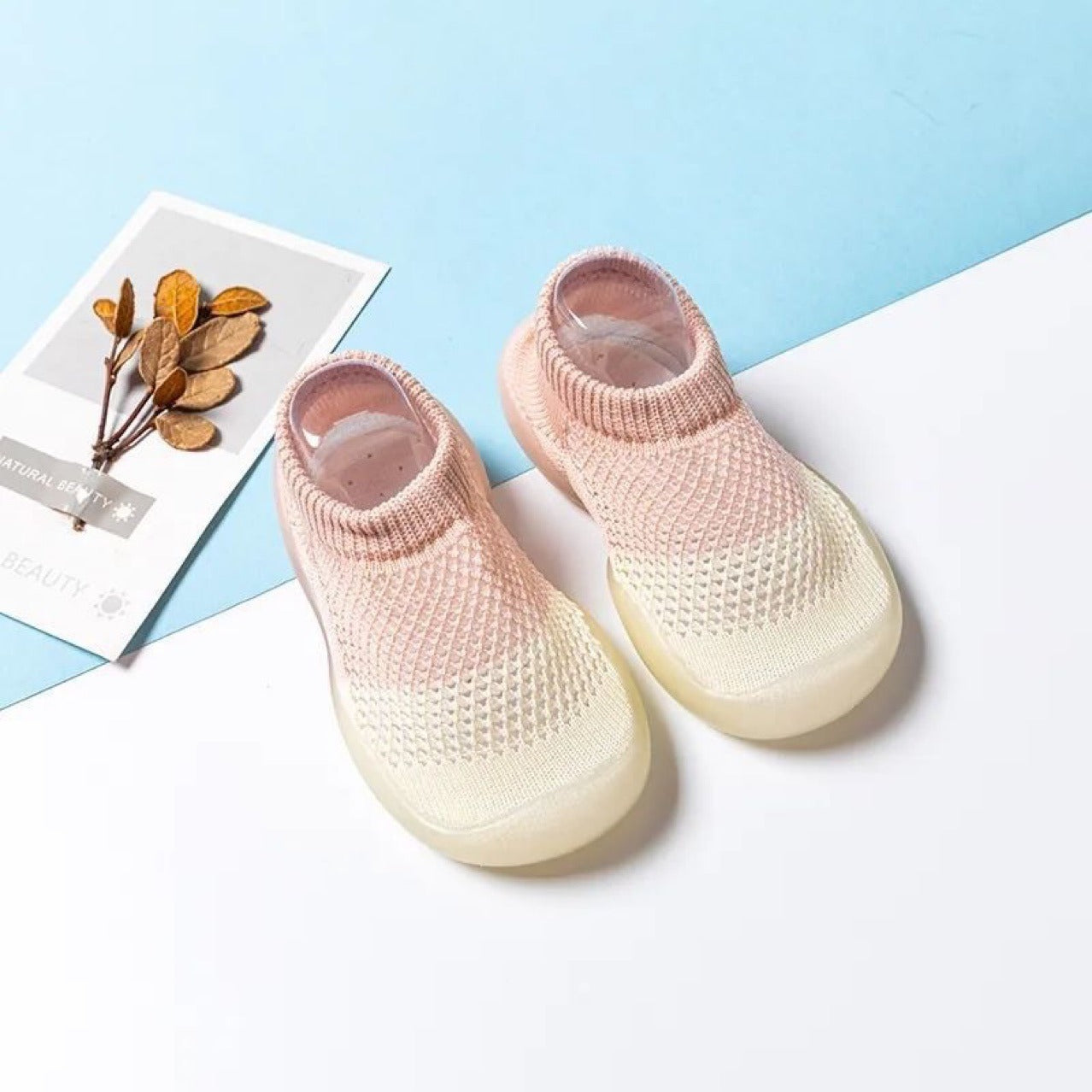 Summer children's soft sole anti-slip mesh shoes with floor holes.