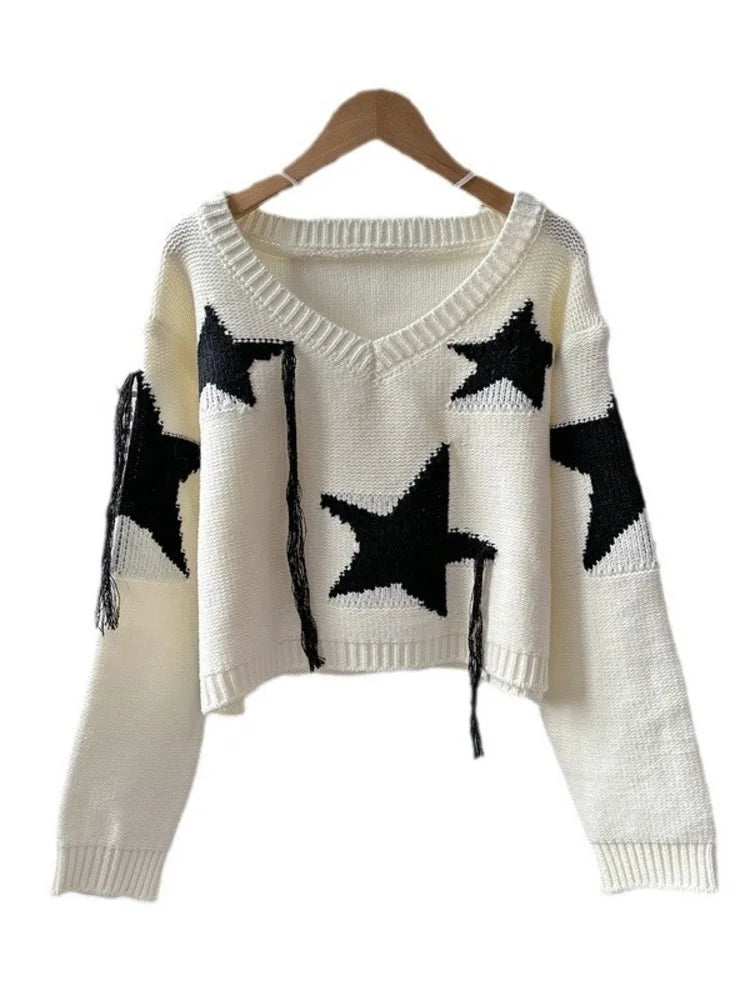 Women's black and cream V-neck tassel star pullover for autumn/winter.