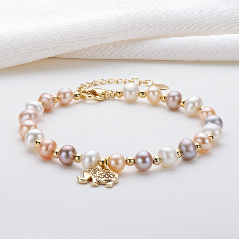 Elephant pearl bracelet with natural pearls, a perfect gift in gold packaging.