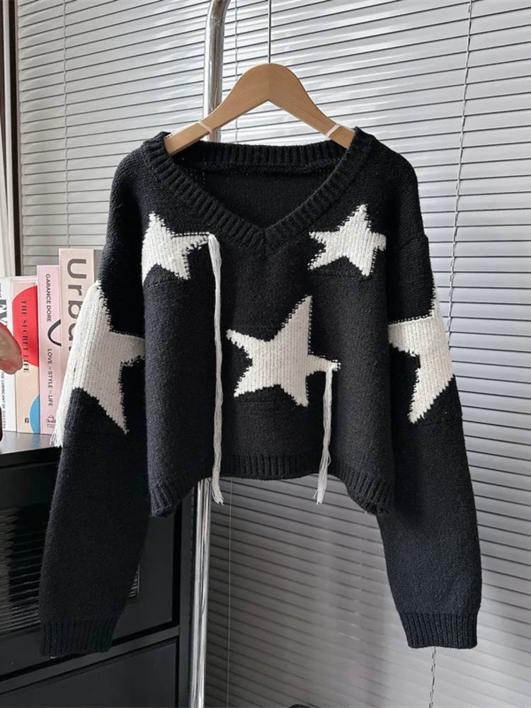 Women's black and cream V-neck tassel star pullover for autumn/winter.