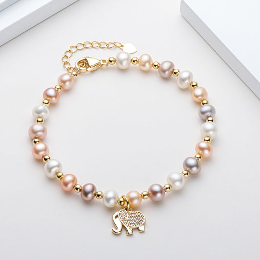 Elephant pearl bracelet with natural pearls, a perfect gift in gold packaging.