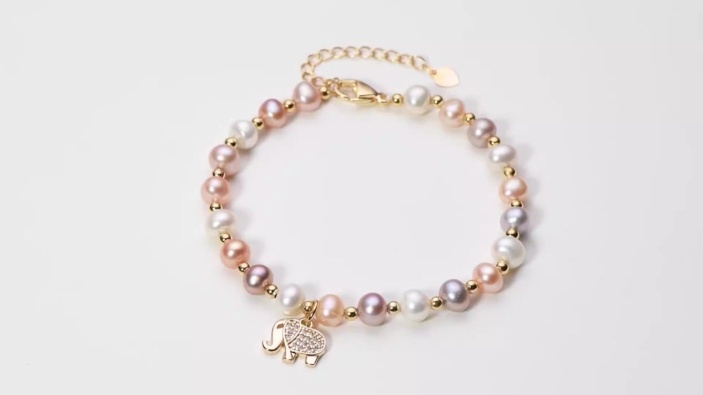 Elephant pearl bracelet with natural pearls, a perfect gift in gold packaging.