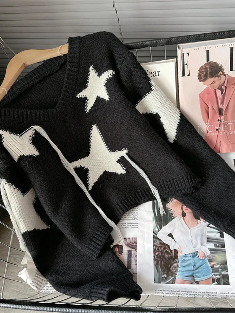 Women's black and cream V-neck tassel star pullover for autumn/winter.