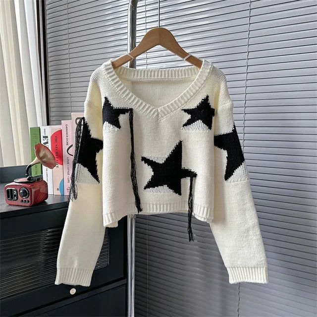 Women's black and cream V-neck tassel star pullover for autumn/winter.