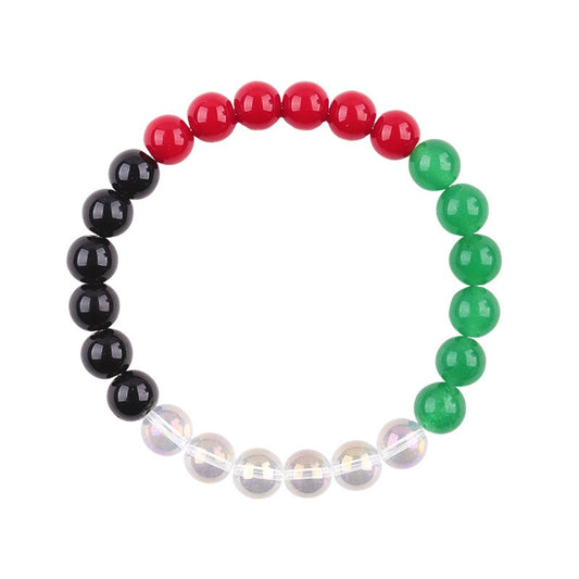 Palestine flag bracelet with silver, red, and green acrylic letter beads.