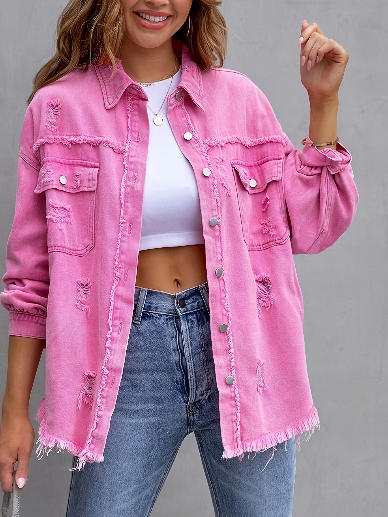 medium-length distressed patchwork denim jacket