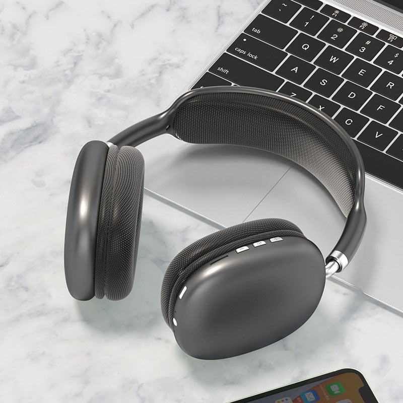 Bluetooth over-ear headset with 5.3 connectivity and long battery life, compatible with Apple, Huawei, and Xiaomi.