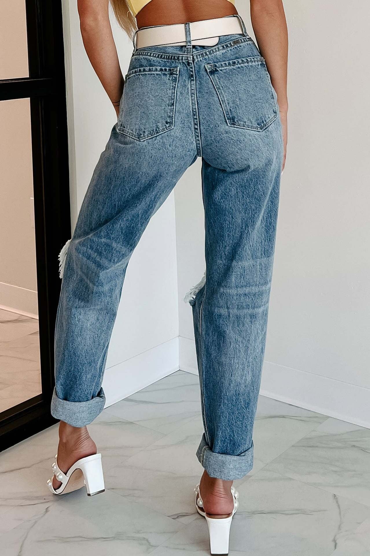 Women's high-waist ripped blue jeans