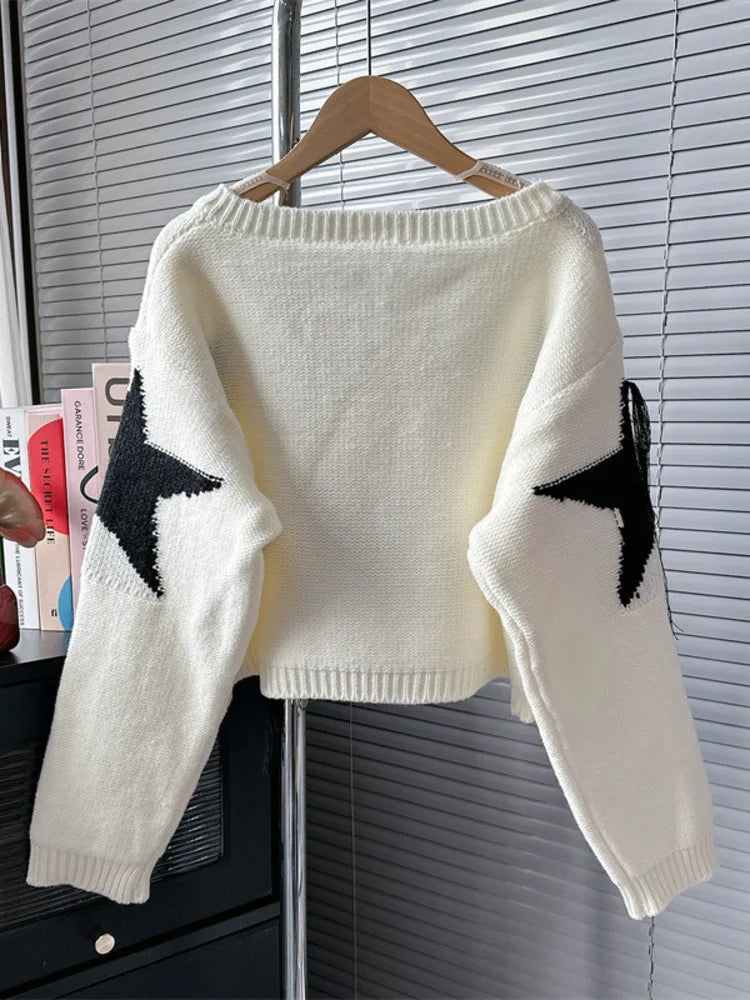 Women's black and cream V-neck tassel star pullover for autumn/winter.