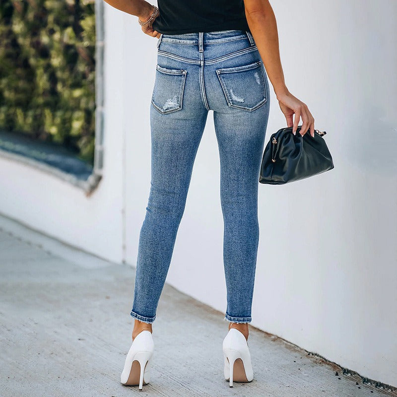 Women's high-waist ripped blue jeans