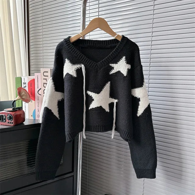 Women's black and cream V-neck tassel star pullover for autumn/winter.