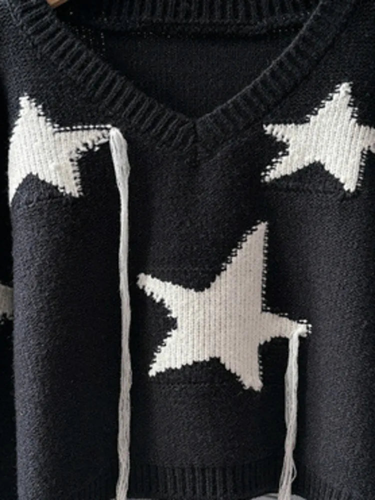 Women's black and cream V-neck tassel star pullover for autumn/winter.